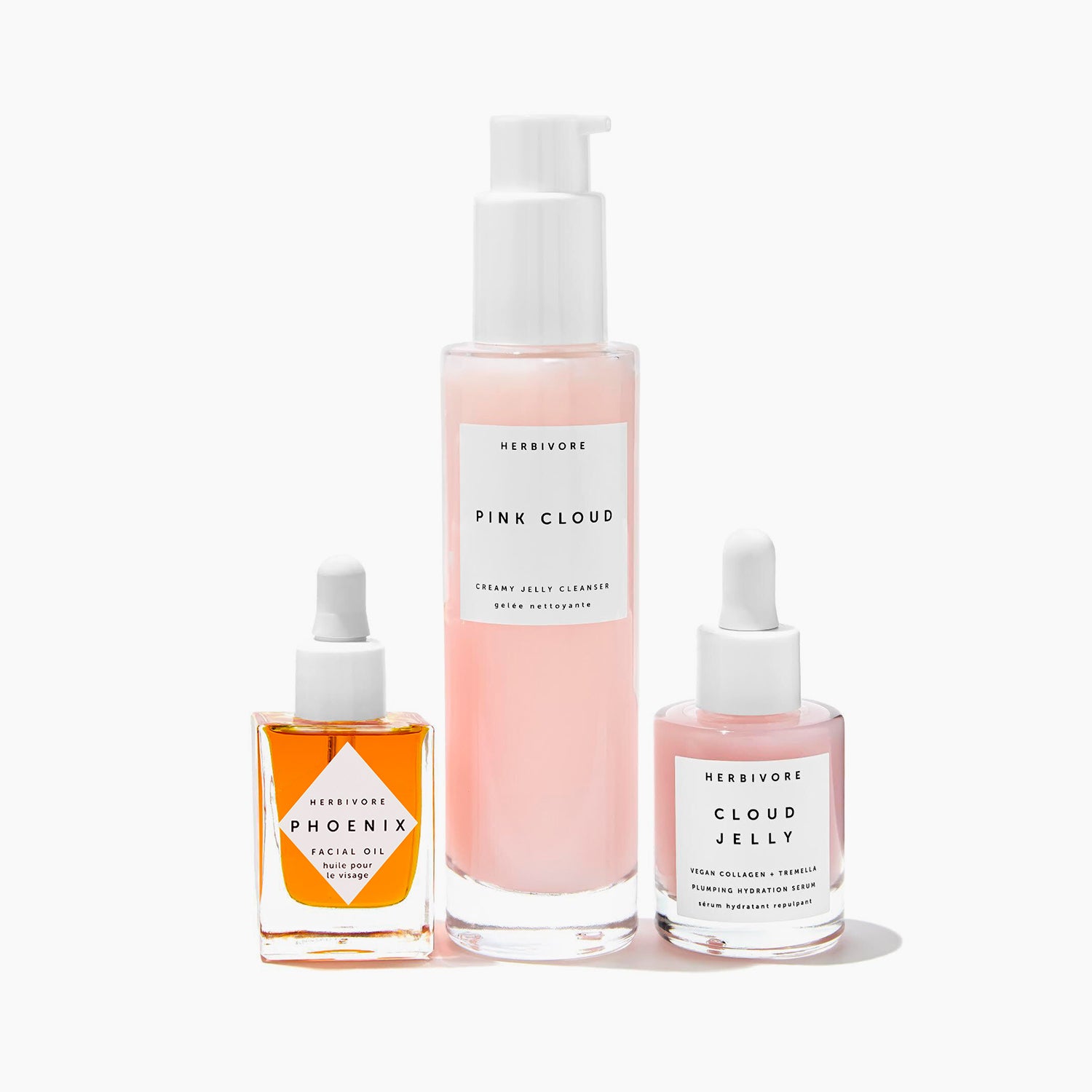 Bottles of full-size Pink Cloud Cleanser, orance Phoenix Face Oil and pink Cloud Jelly Serum | Hydration Heroes Bundle