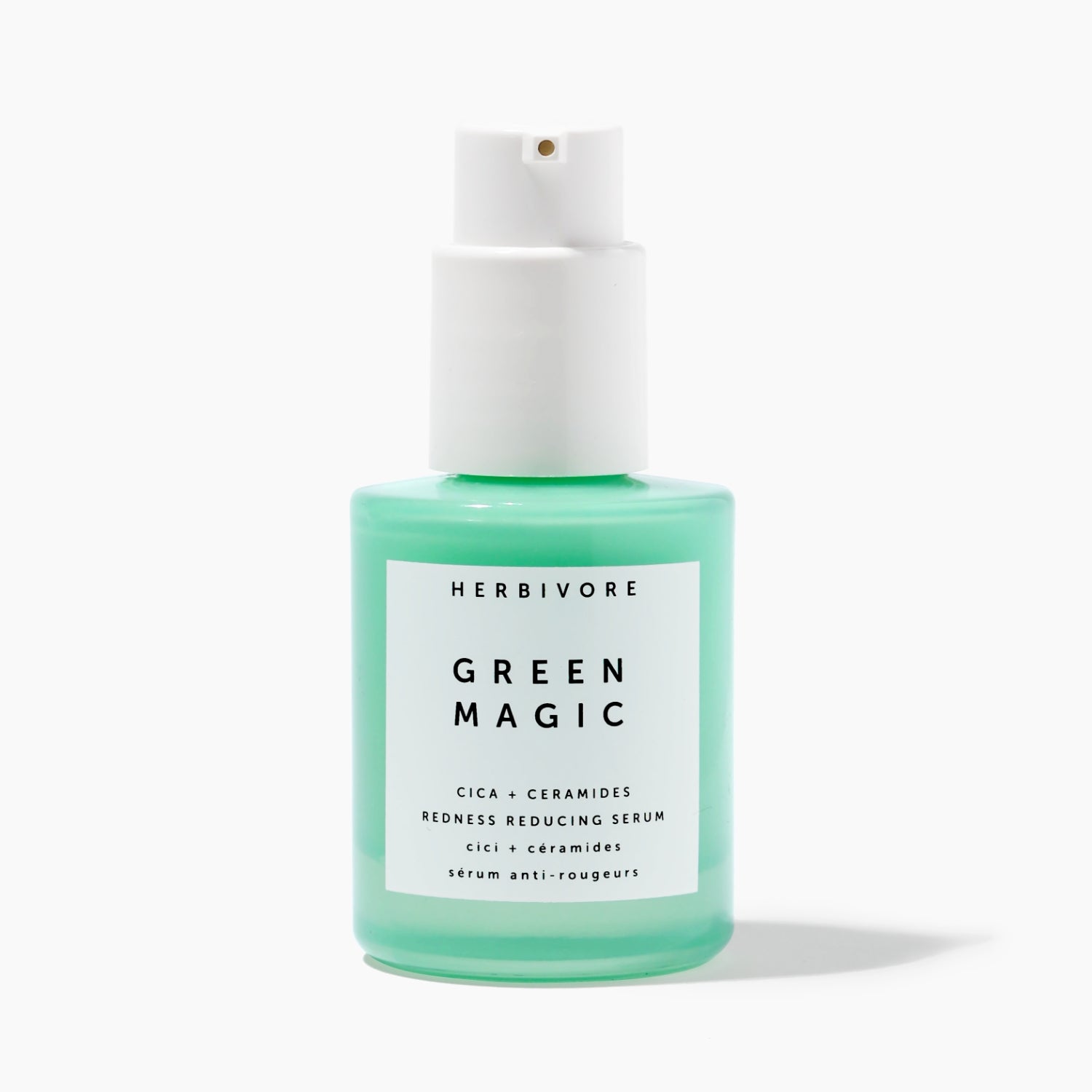 Bottle of Green Magic Redness Reducing Serum with shadow