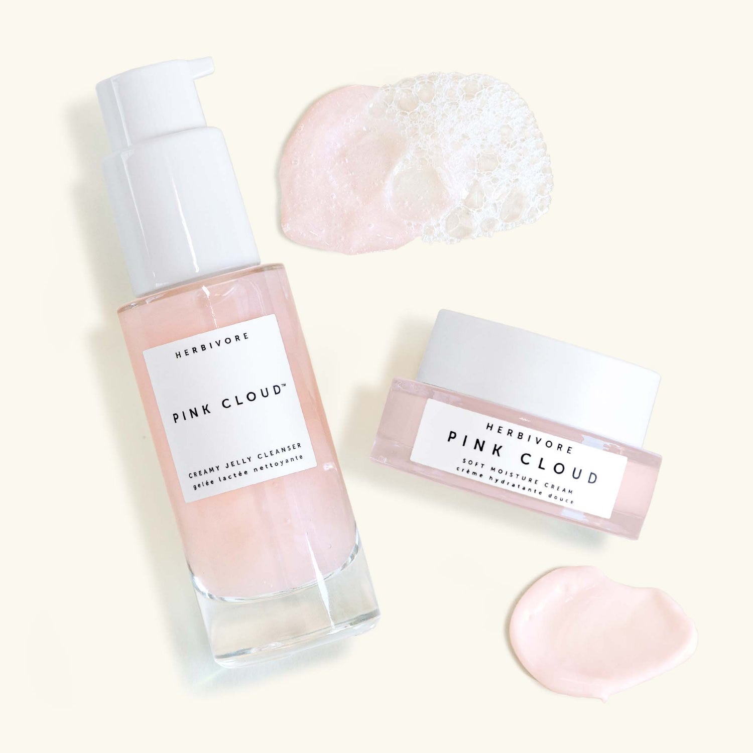 Mini Pink Cloud Cleanser and Pink Cloud Cream with product smears
