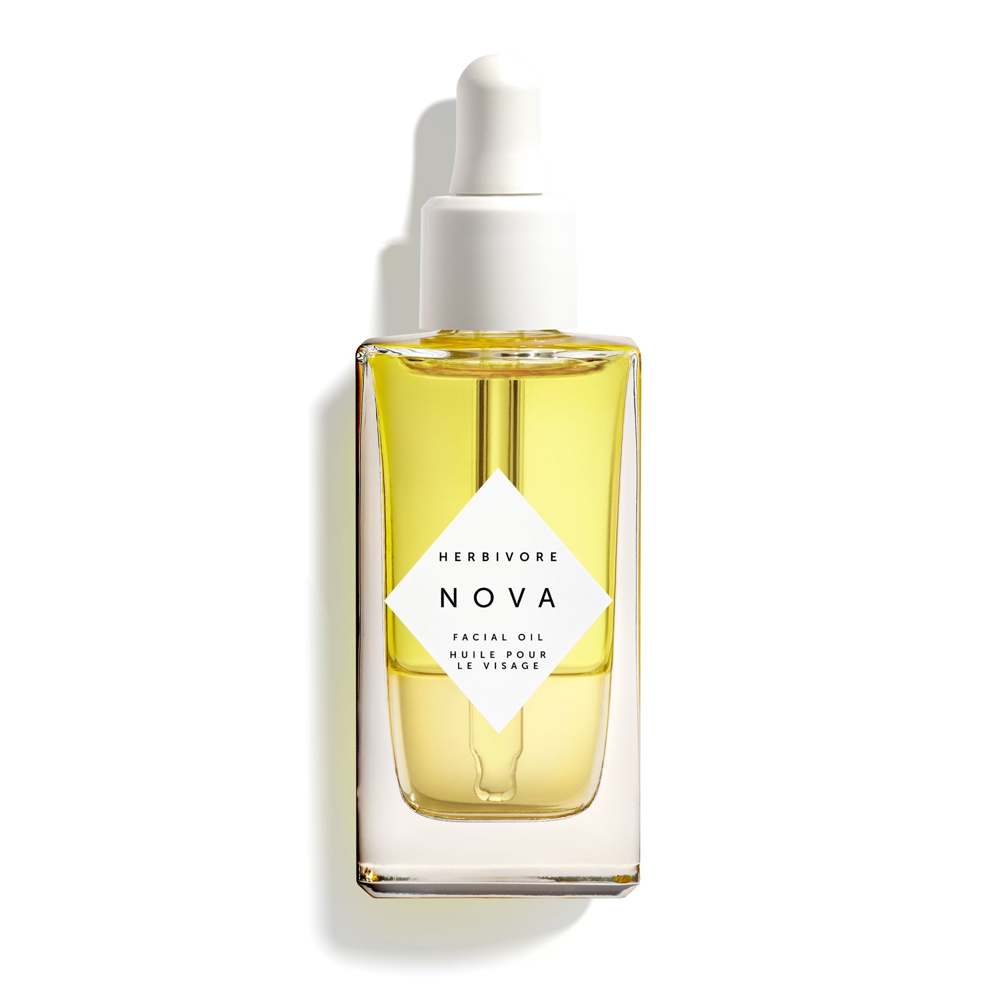 Herbivore Nova facial oil bottle with dropper on a white background