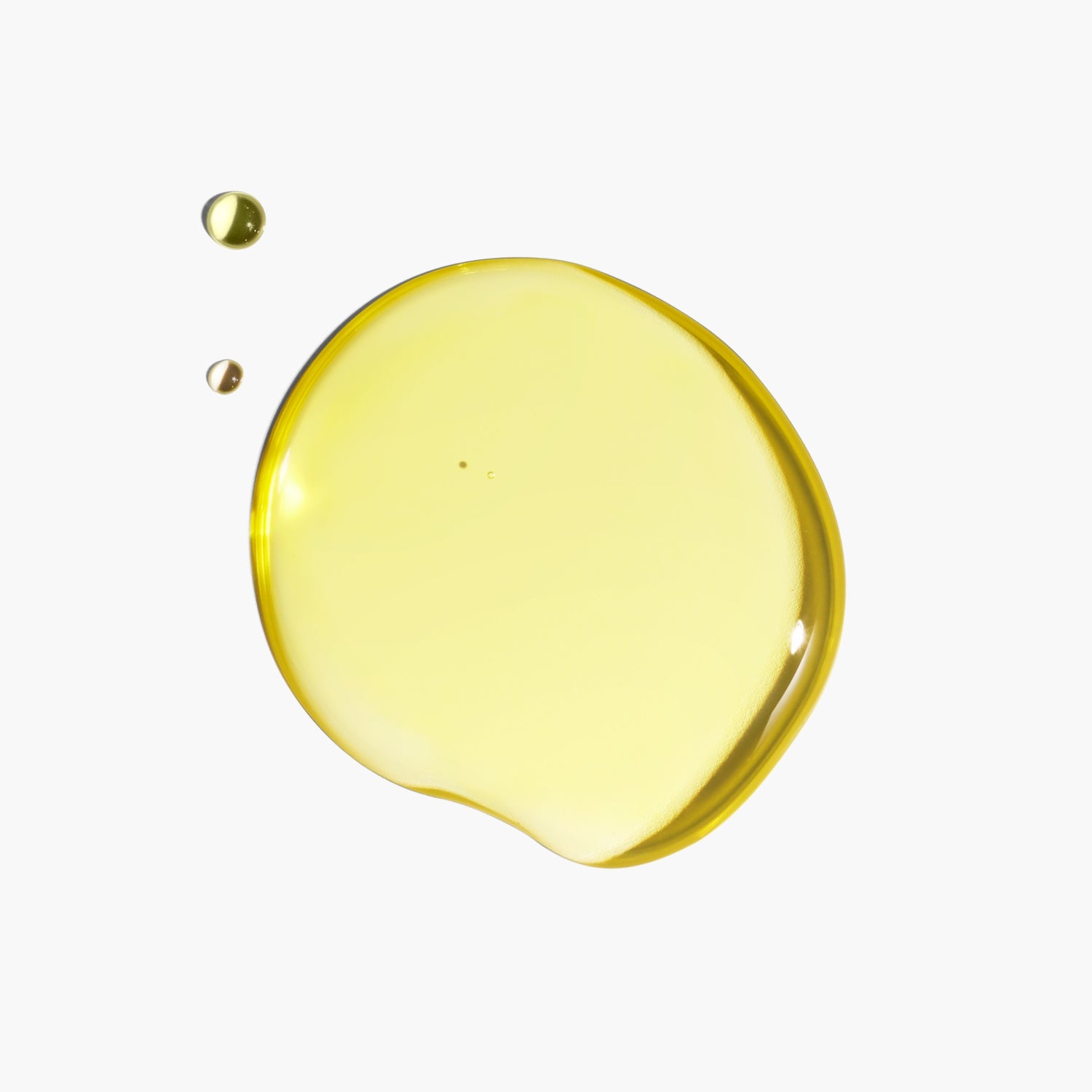 Golden yellow drops of Orchid Facial Oil